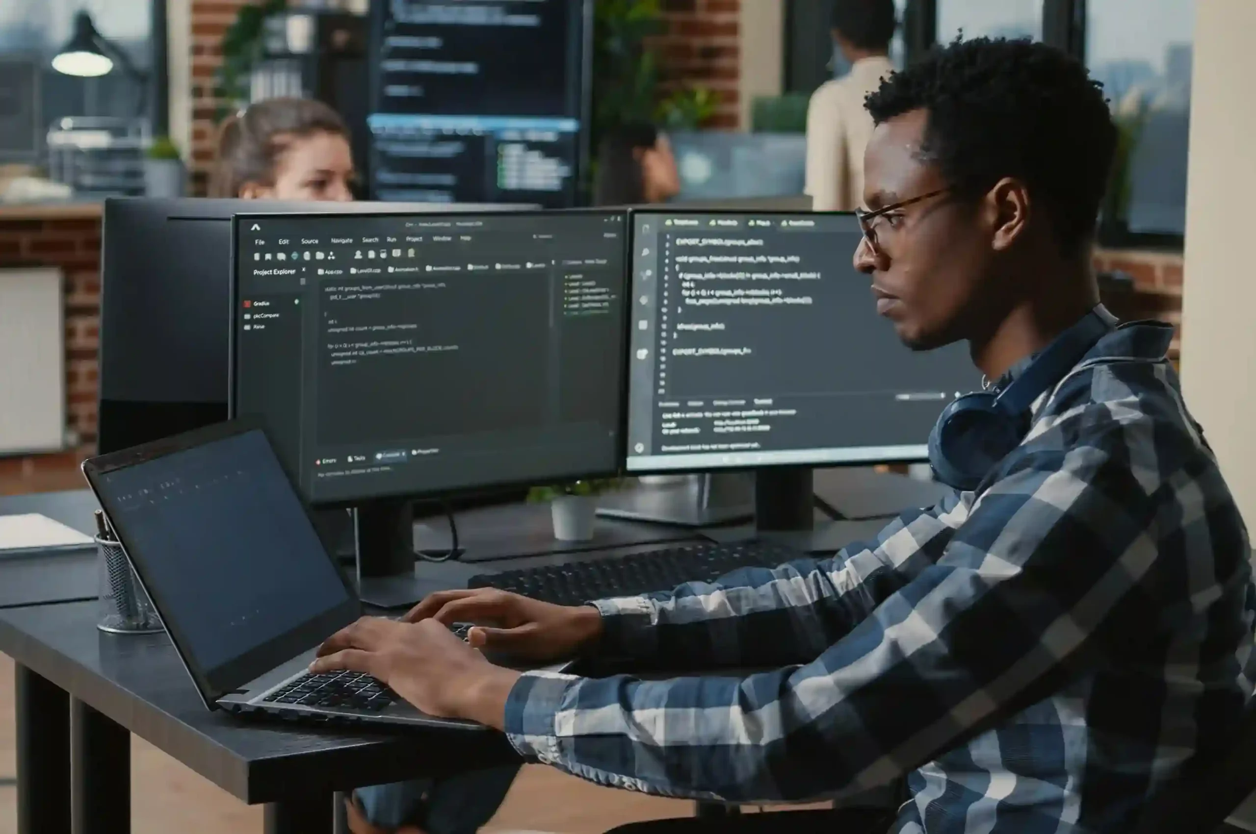 Developer building custom applications with Indosoft Partner Program, powered by a solid, high-availability architecture. A software developer using the Indosoft Partner Program to build applications, leveraging Indosoft’s robust architecture for solid customer solutions
