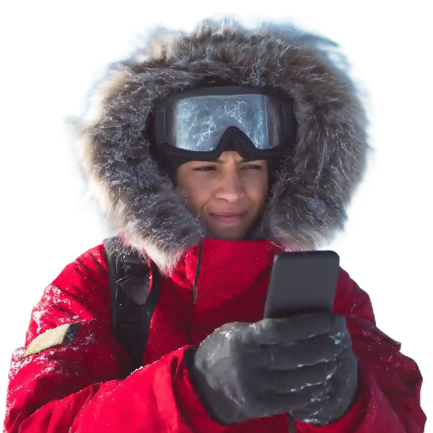 Indosoft keeps travelers connected wherever they go — enabling guests to reach hotels, request services, and stay supported even from remote destinations. A traveler in a red jacket uses Indosoft hospitality technology on his phone to reach his hotel while standing alone in a vast, snowy landscape.