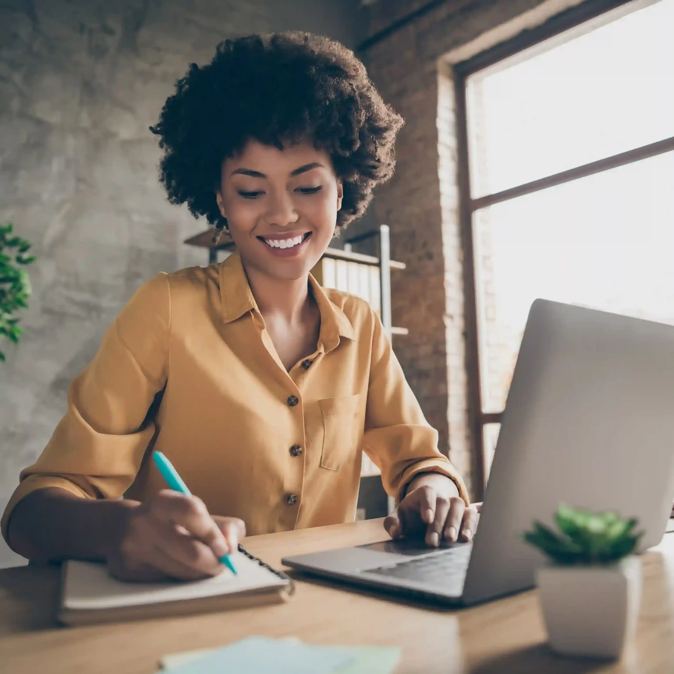 Executive in a modern office using Indosoft’s training platform, exploring role-based paths that grow team potential and productivity. Executive employee using Indosoft training on a laptop, reviewing tailored learning paths to elevate team capability and efficiency.