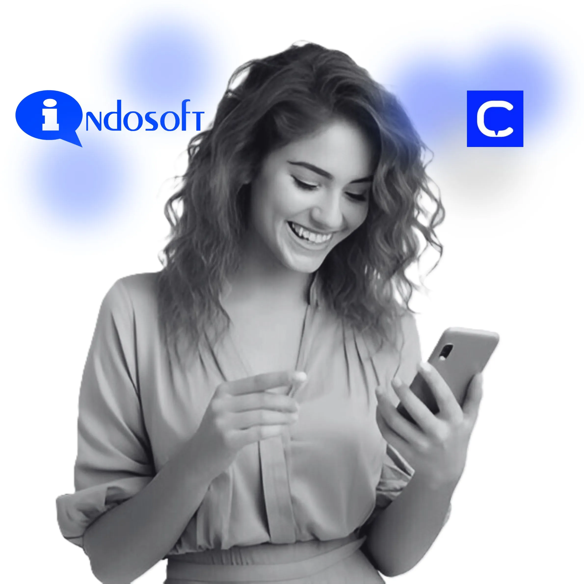 A woman smiling while using her smartphone as she compares the Indosoft and CloudTalk communication platforms displayed behind her. A woman smiling while using her smartphone as she compares the Indosoft and CloudTalk communication platforms displayed behind her.