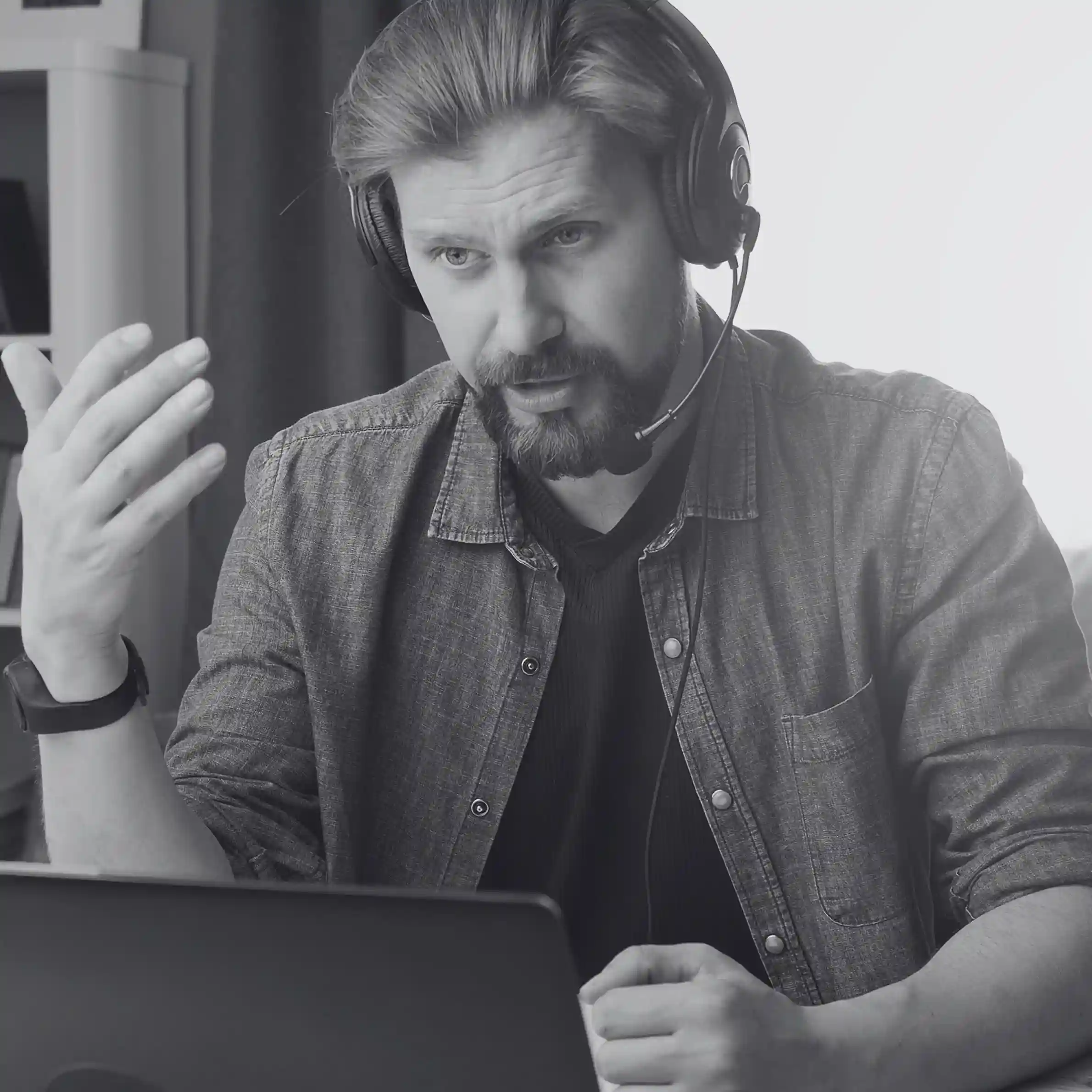 Indosoft team member providing expert guidance on choosing a more powerful system than Line2. Indosoft expert wearing a headset speaking with a client about upgrading from Line2 to Indosoft.