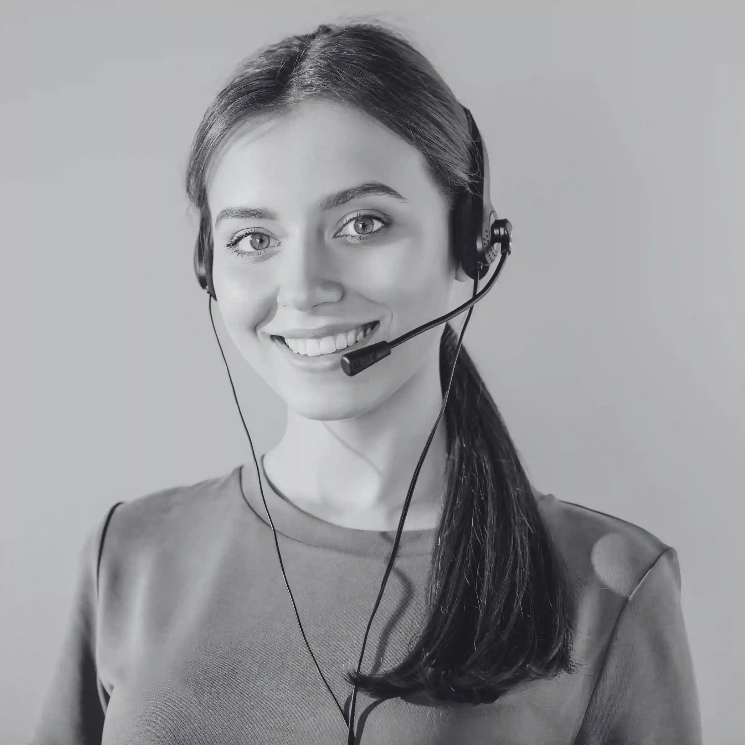 Customer support agent with headset representing Indosoft’s expert guidance for businesses moving from JustCall. Professional call center specialist showing Indosoft’s readiness to assist teams seeking a better alternative to JustCall.