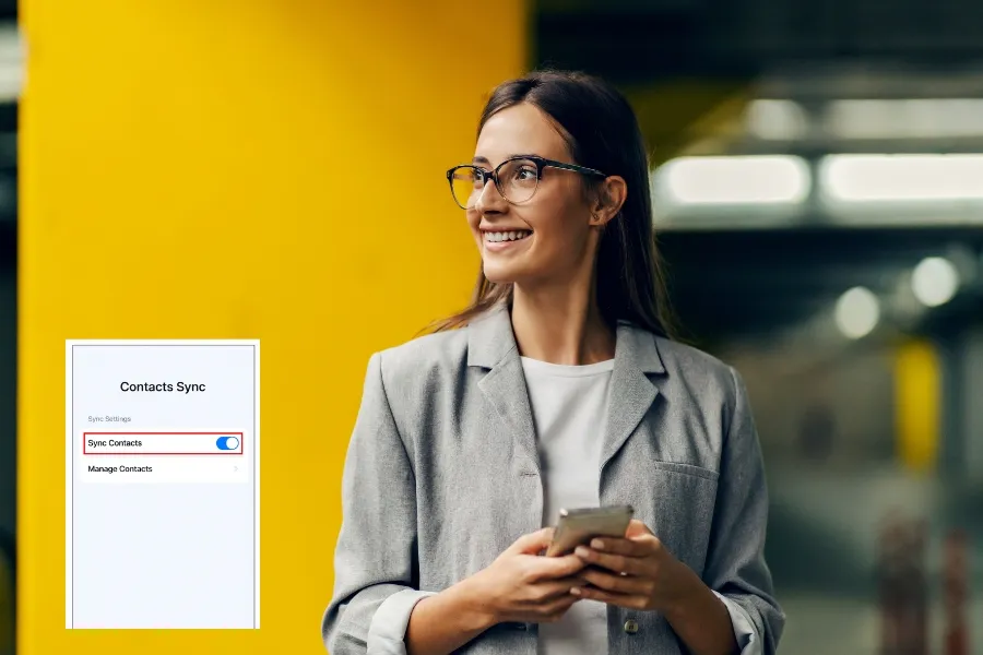 Indosoft high-volume contact upload interface displayed next to a smiling woman holding a phone. Professional woman using her phone beside an Indosoft screen showing high-volume contact sync.