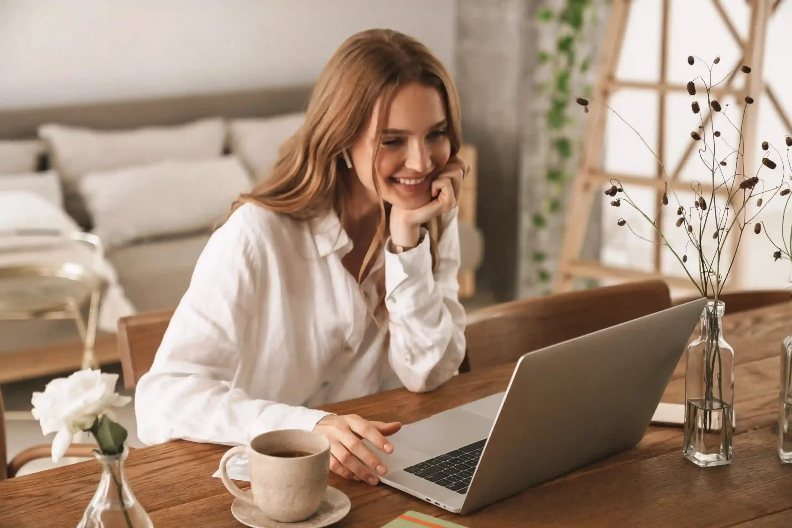An employee reviews call details on her laptop at home, handling conversations smoothly using a unified call workspace designed to reduce distractions. A remote employee works comfortably from home, managing active calls and related tasks through a single unified interface without switching between tools.