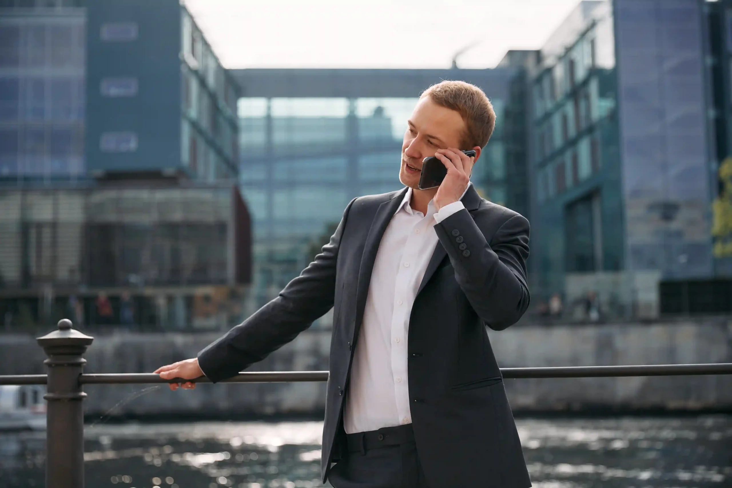 Multi-level IVR provides structured guidance that reduces confusion, shortens hold times, and creates a smoother caller experience. A business professional confidently handles a call outdoors, smoothly following IVR prompts that guide him to the right department without delays or confusion.