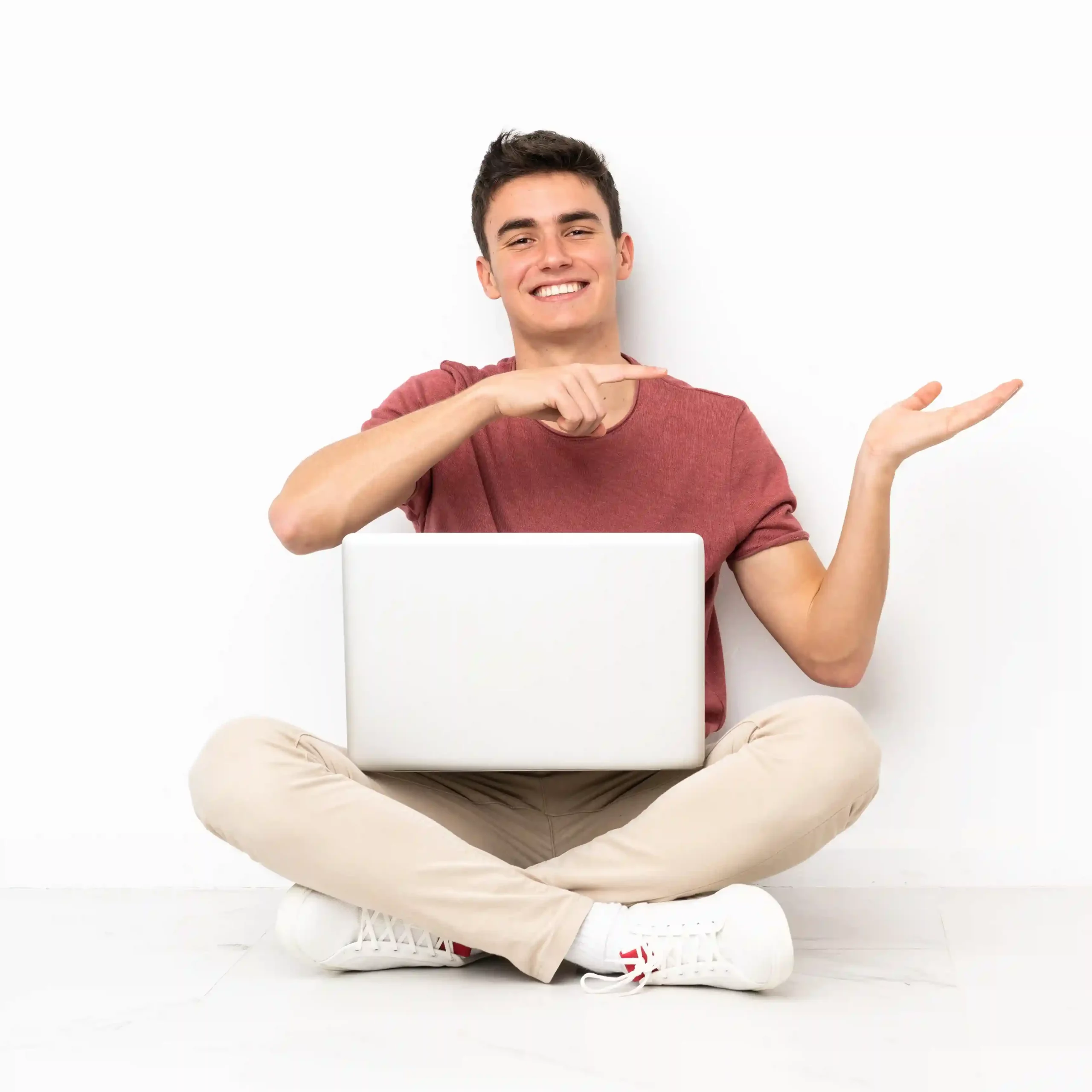 Working comfortably on his laptop, a team member points toward a scheduled messaging workflow, showing how planned SMS and MMS simplify customer communication Sitting with his laptop, a contact center professional gestures toward scheduled messaging options, highlighting how teams can plan SMS and MMS communication without manual effort
