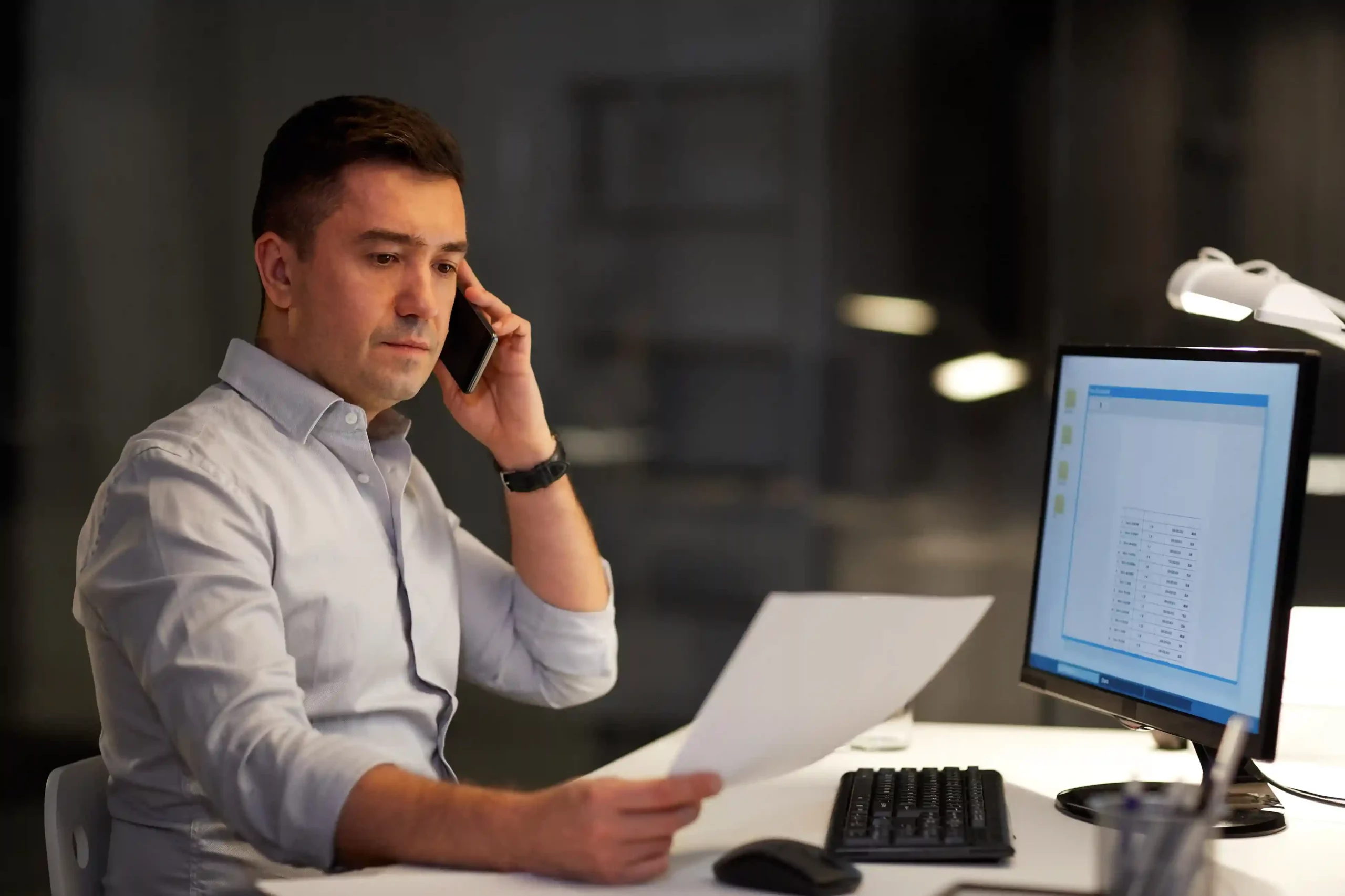 A professional makes an important call to a service provider using a toll-free number, ensuring easy and cost-free access to expert support. A business owner reviews documents while speaking with a consultant on a toll-free call, reaching out confidently without worrying about call charges.