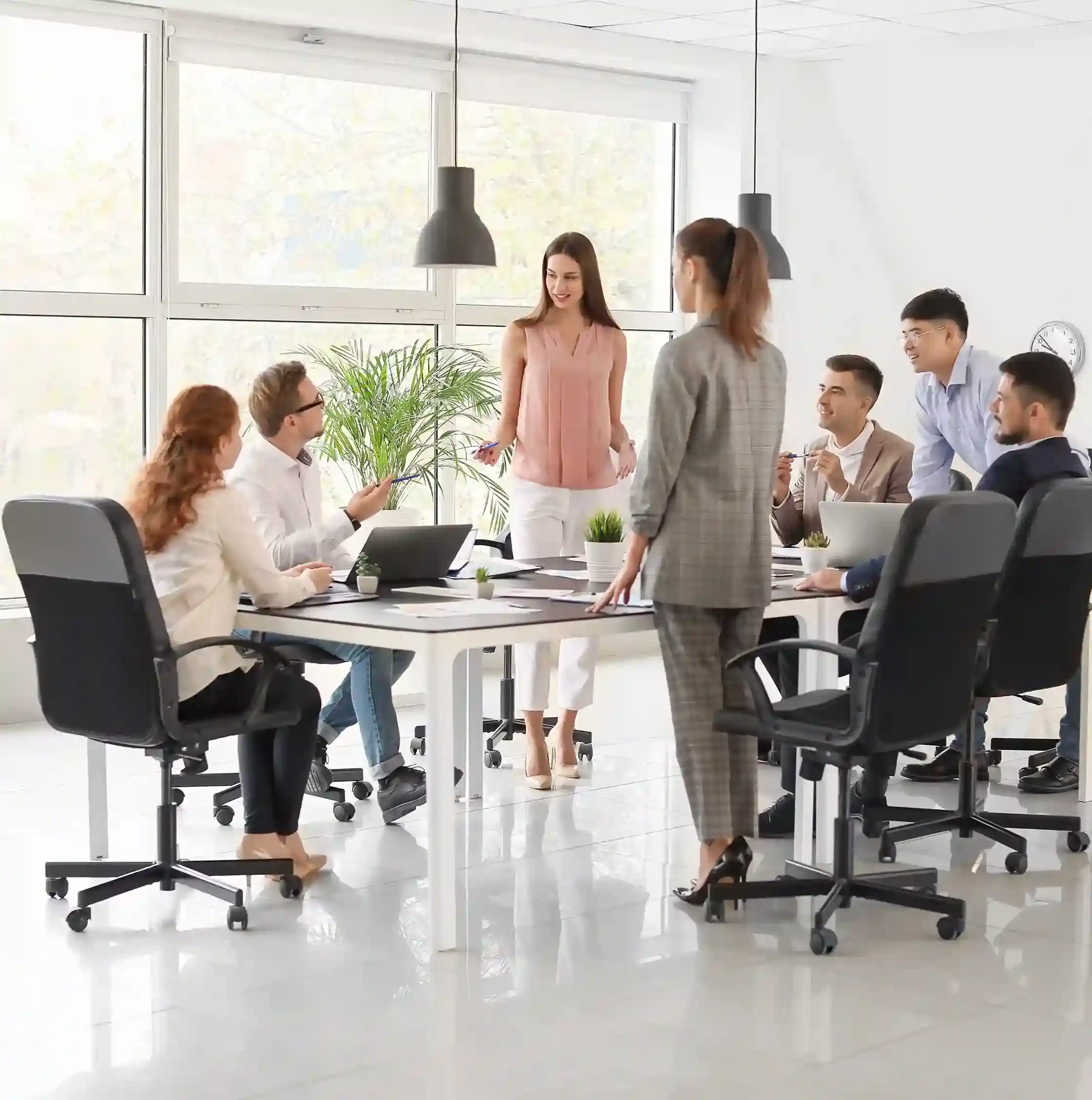 Business leaders planning scalable communication workflows supported by Indosoft Enterprise leadership team discussing large-scale communication strategy using Indosoft solutions