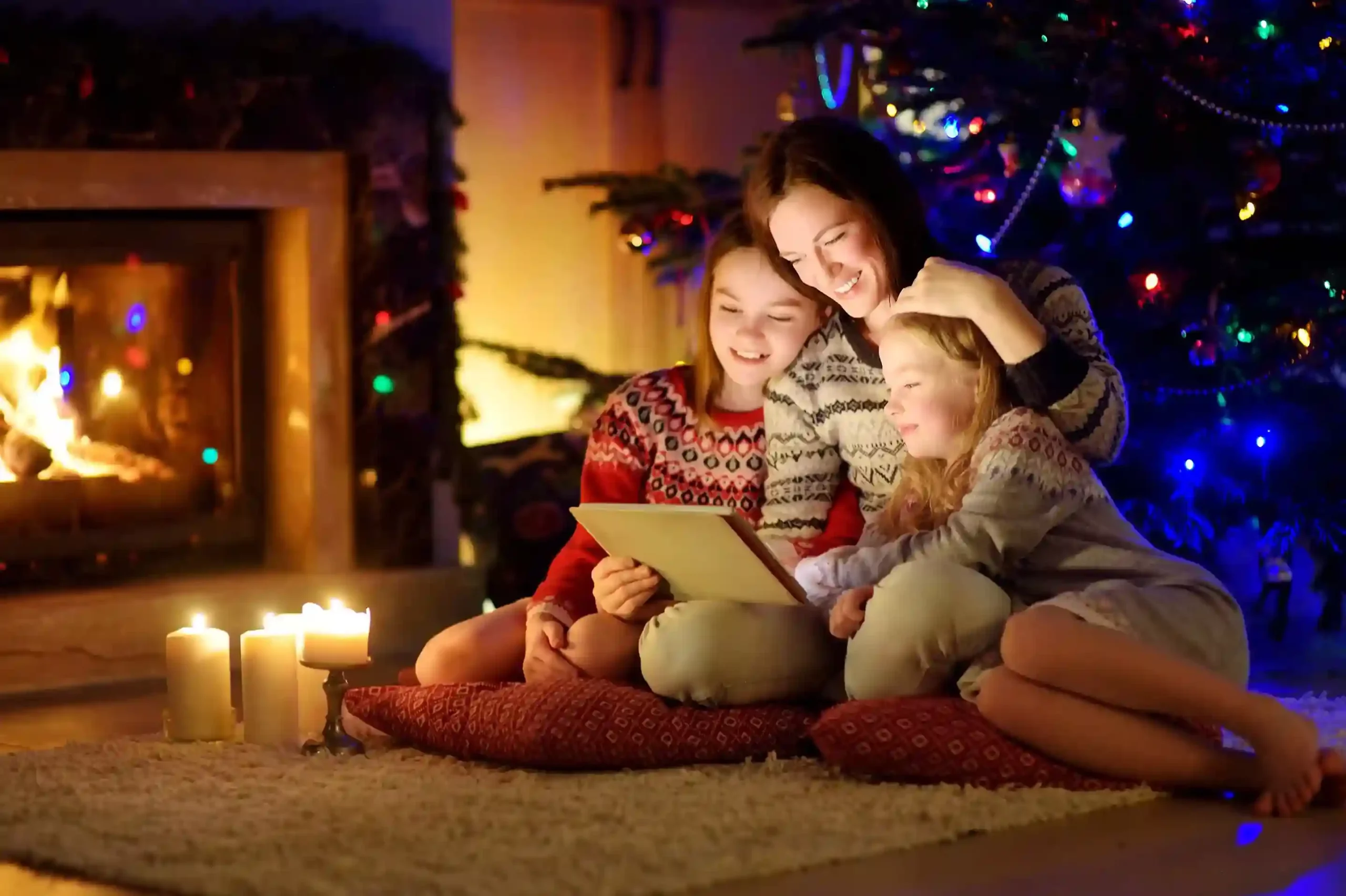 A peaceful family moment by the fireplace symbolizes how quick after-call workflows reduce stress and save time for agents. A professional enjoys a calm moment at home with family, reflecting how faster after-call workflows free up time after interactions are completed.