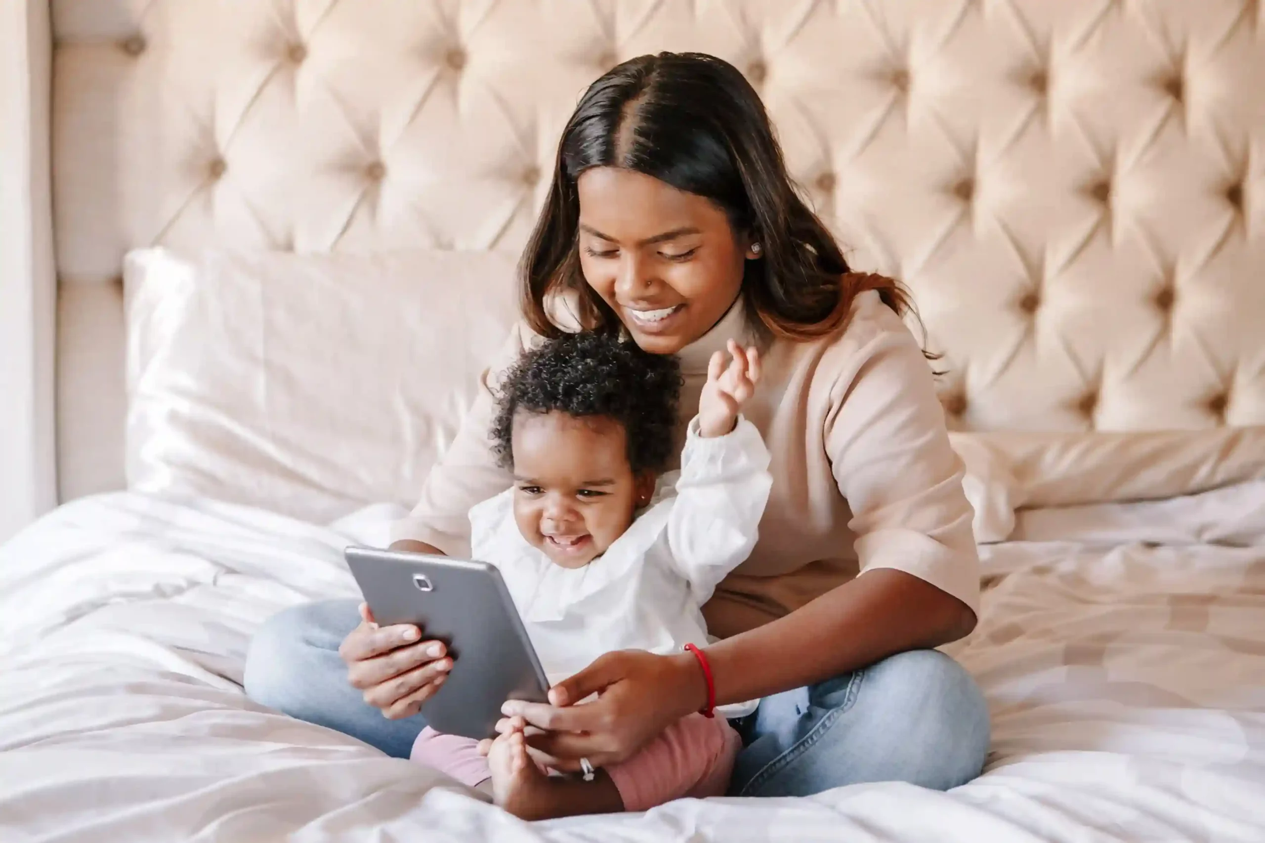 A mother relaxes in a hotel room with her child as she receives a voicemail update about dinner availability, showing how Indosoft’s voicemail drop reaches guests efficiently without requiring live calls A mother relaxes in a hotel room with her child as she receives a voicemail update about dinner availability, showing how Indosoft’s voicemail drop reaches guests efficiently without requiring live calls