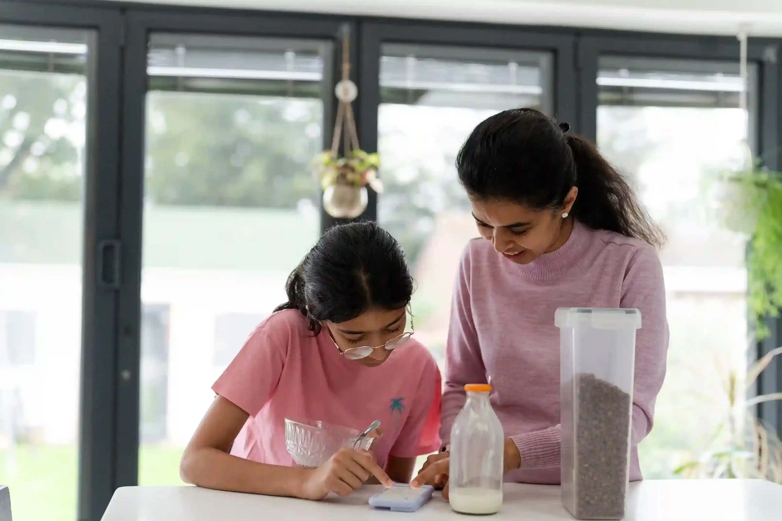 A mother helps her daughter block an unwanted phone call instantly using Indosoft’s call blocking feature. A mother helps her daughter block an unwanted phone call instantly using Indosoft’s call blocking feature.