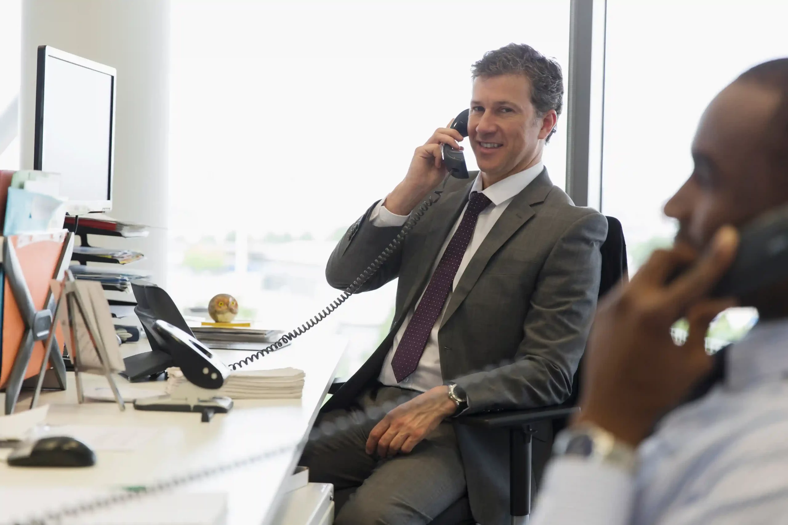 A supervisor monitors an ongoing call and provides behind-the-scenes guidance, helping an agent stay on track while the customer remains unaware. A supervisor listens in on an active call from his desk, quietly guiding an agent through the conversation without interrupting the customer experience.