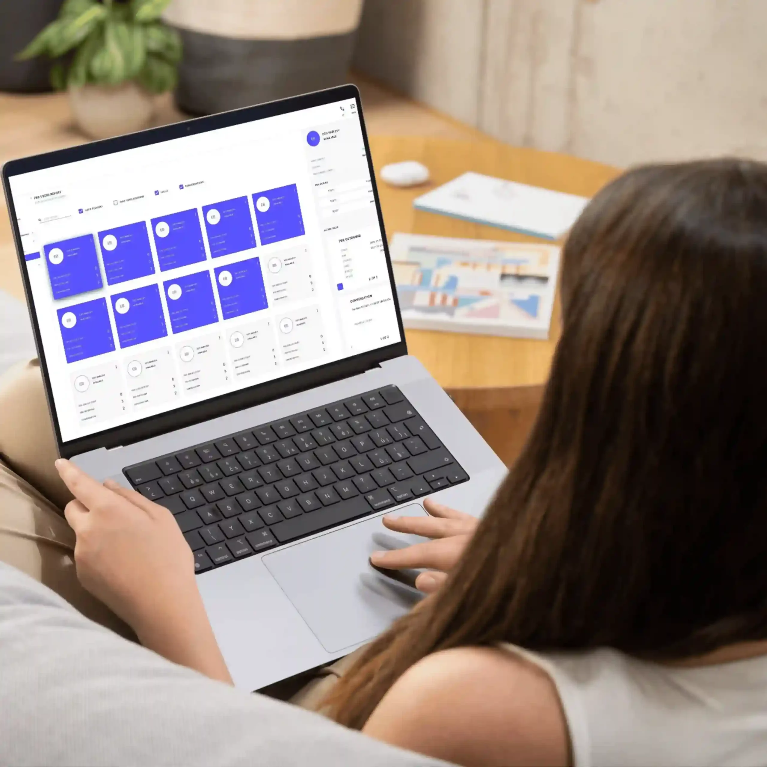 Client engaging with Indosoft SYNQ via tablet to discuss system integration, workflow optimization, and business scalability. Business professional viewing Indosoft’s SYNQ platform on a tablet to contact Indosoft and learn about performance-driven solutions.
