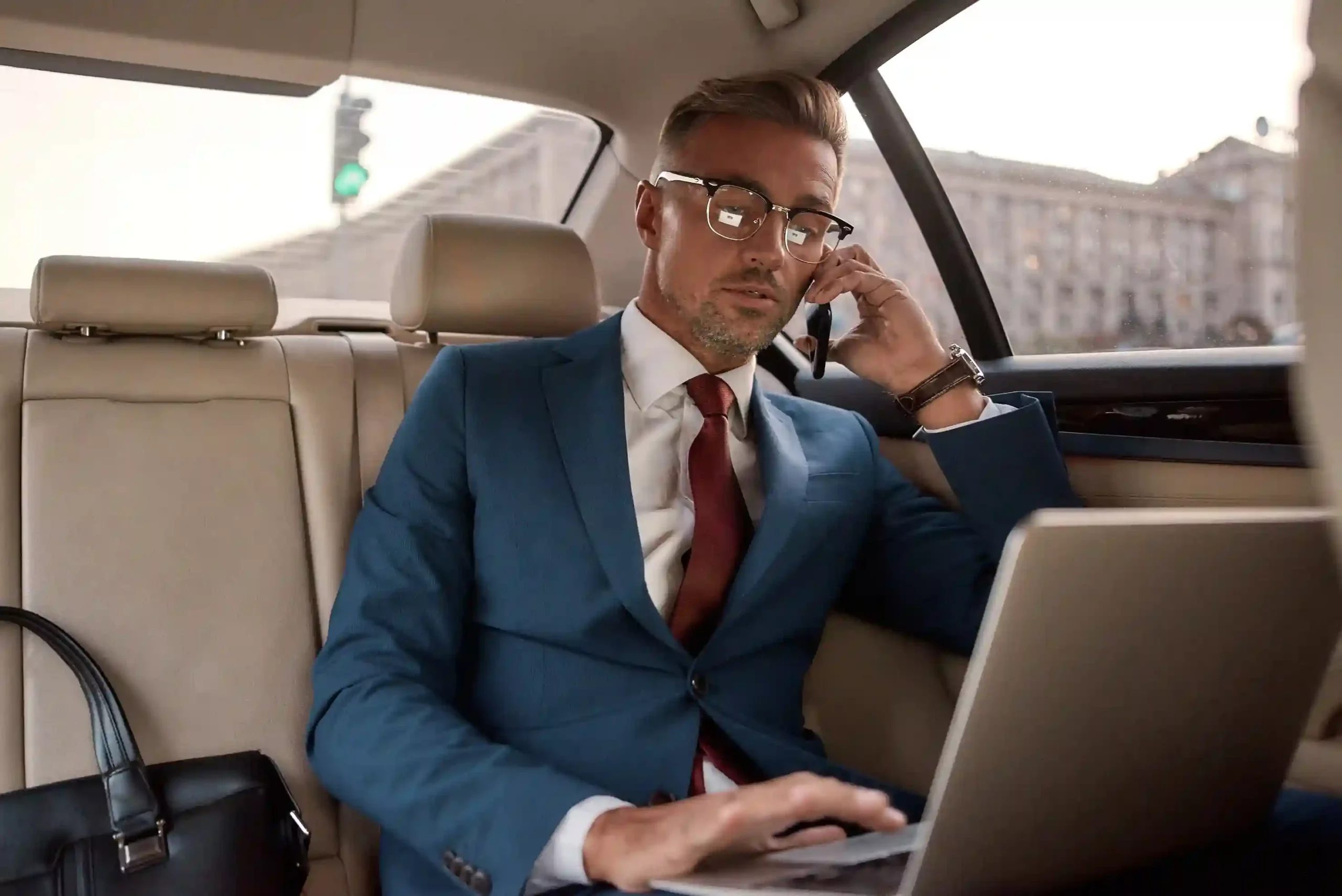 Business leader managing role-based access and audit logging across remote teams with Indosoft Enterprise director coordinating secure access and audit controls with distributed teams using Indosoft governance features