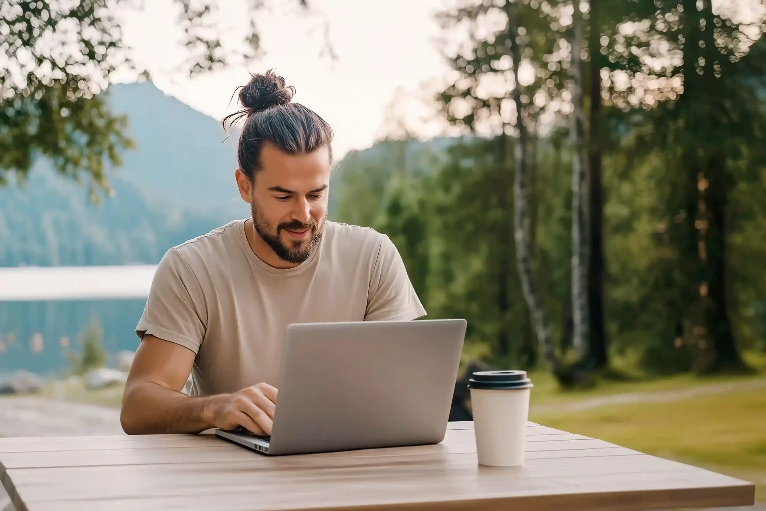 An enterprise professional reviewing unified business data on a laptop using Indosoft integrations while traveling Remote enterprise user accessing integrated CRM and analytics data using Indosoft from a camper van workspace