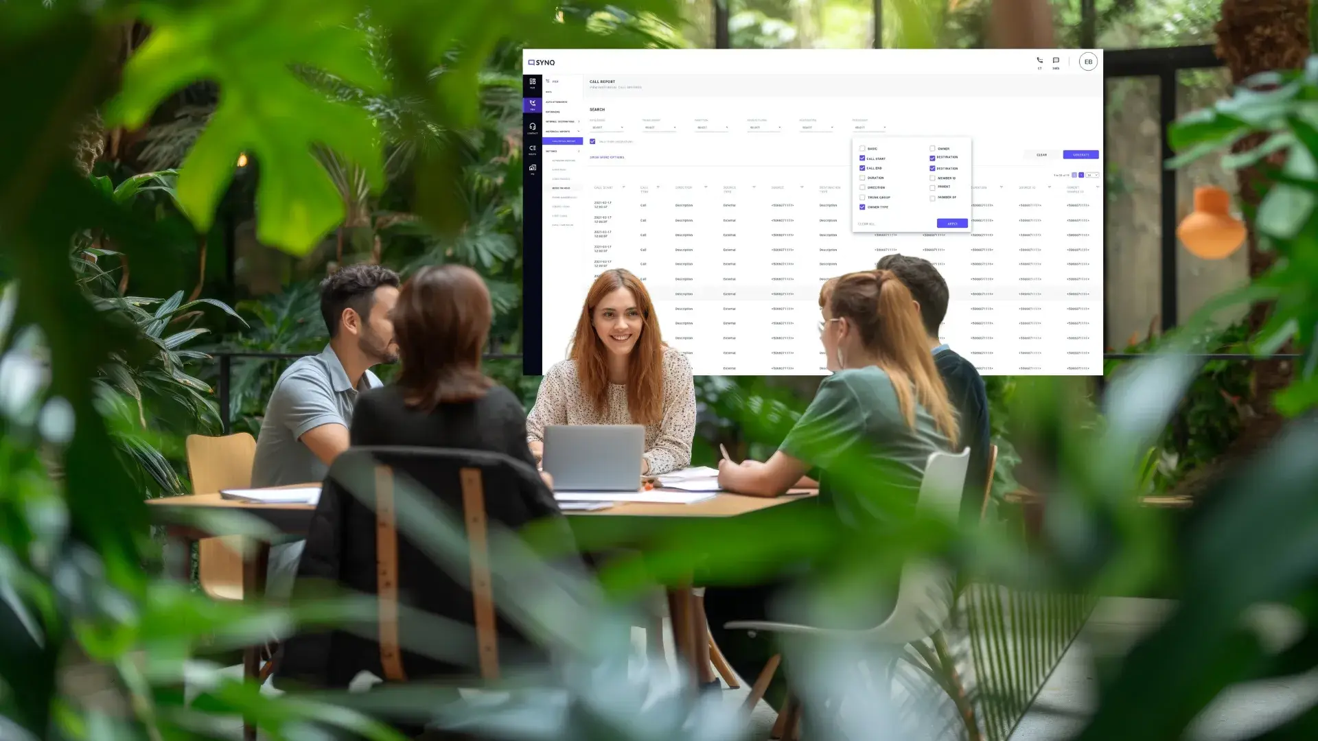 An Indosoft employee presenting a high-performance enterprise communication solution to clients during a strategic discussion. An Indosoft enterprise consultant discussing a scalable communication platform with clients using a laptop in a collaborative meeting.
